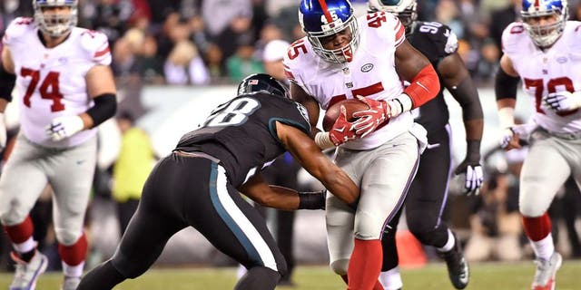 Oct 19, 2015; Philadelphia, PA, USA; New York Giants tight end Will Tye (45) is tackled by Philadelphia Eagles outside linebacker Jordan Hicks (58) during the first quarter at Lincoln Financial Field. Mandatory Credit: Eric Hartline-USA TODAY Sports
