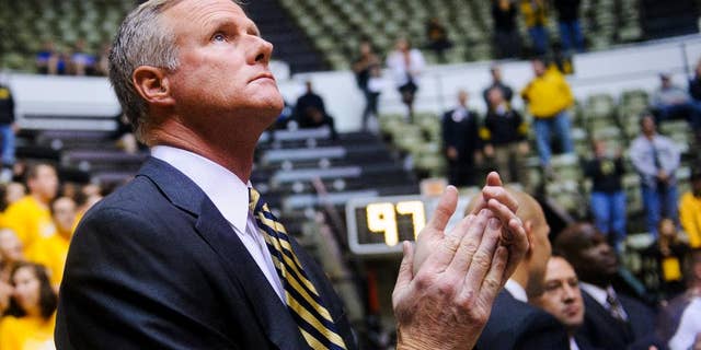 Missouri head coach Kim Anderson stands before the start of an NCAA college basketball game against William Jewell in Columbia, Mo., on Wednesday, Oct. 29, 2014. (AP Photo/The Columbia Daily Tribune, Nick Schnelle)