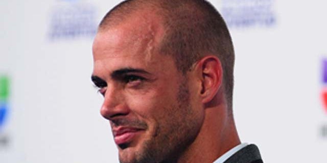 July 21, 2011: William Levy attends 'Premios Juventud' at the Bank United Center in Miami, Florida.