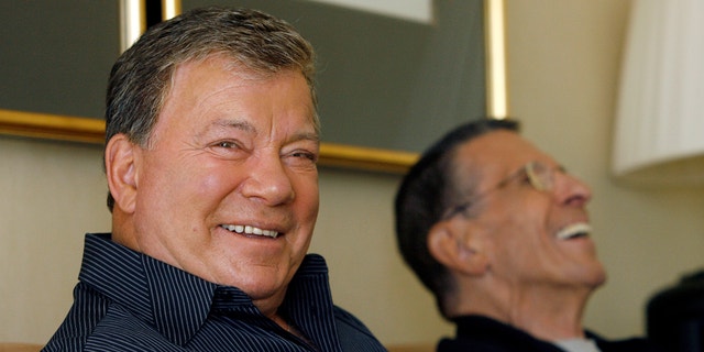 Actors William Shatner and Leonard Nimoy laugh during an interview for the 40th anniversary of the science-fiction television series 'Star Trek' in Los Angeles August 9, 2006.