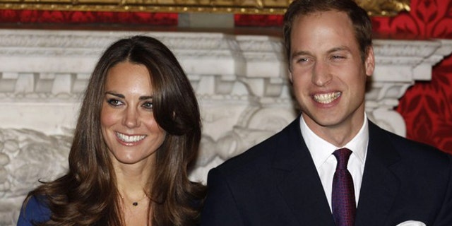 Britain's Prince William and his fiancee Kate Middleton pose for a photograph in St. James's Palace, central London in a Nov. 16, 2010 file photo (Reuters).