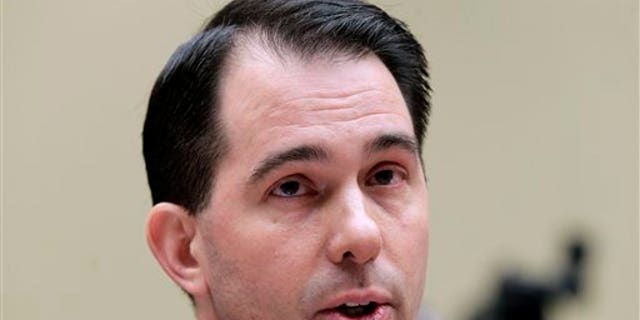 April 14: Wisconsin Gov. Scott Walker testifies on Capitol Hill in Washington, before the House Oversight and Government Reform Committee hearing to discuss the problems with balancing state budgets in a tough economy. (AP)