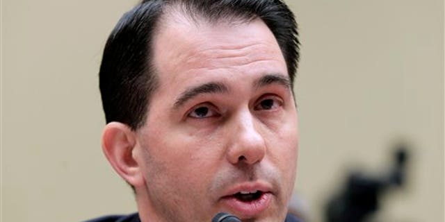 April 14: Wisconsin Gov. Scott Walker testifies on Capitol Hill in Washington, before the House Oversight and Government Reform Committee hearing to discuss the problems with balancing state budgets in a tough economy. (AP)
