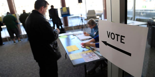 Voters take to the polls at Milwaukee City Hall April 5, 2016 in Milwaukee, Wisconsin.
