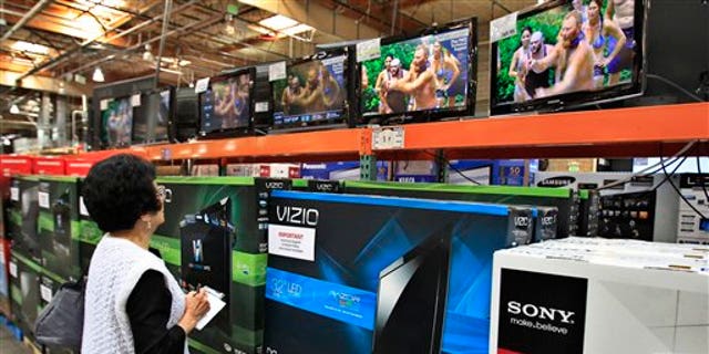 April 23: A shopper looks at televisions at Costco in Mountain View, California.