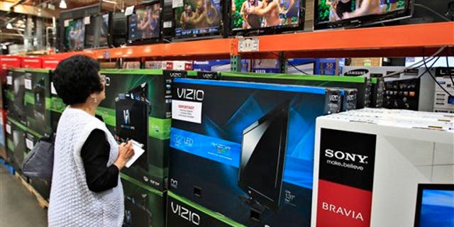 April 23: A shopper looks at televisions at Costco in Mountain View, California.