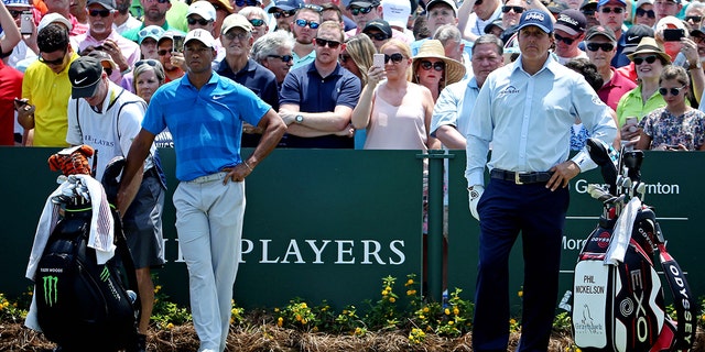 Tiger Woods, left, and Phil Mickelson. The pair reportedly are trying to arrange a $10 million winner-take-all match.