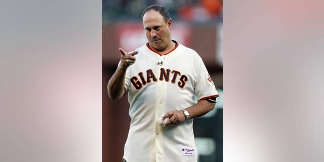 FILE - In this Oct. 14, 2012, file photo, former San Francisco Giant Will Clark prepares to throw out the first pitch before Game 1 of baseball's National League championship series between the San Francisco Giants and the St. Louis Cardinals in San Francisco. Will Clark remembers each moment of the day a major earthquake interrupted the 1989 World Series and Candlestick Park swayed ahead of Game 3 of the Bay Bridge Series against the Oakland Athletics. (AP Photo/Ben Margot, File)