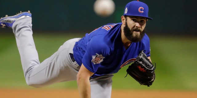 Chicago Cubs starting pitcher Jake Arrieta throws during the first inning of Game 2 of the Major League Baseball World Series against the Cleveland Indians Wednesday, Oct. 26, 2016, in Cleveland. (AP Photo/Gene J. Puskar)