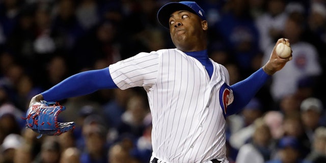 Chicago Cubs relief pitcher Aroldis Chapman throws during the seventh inning of Game 5 of the Major League Baseball World Series =ai-Sunday, Oct. 30, 2016, in Chicago. (AP Photo/David J. Phillip)