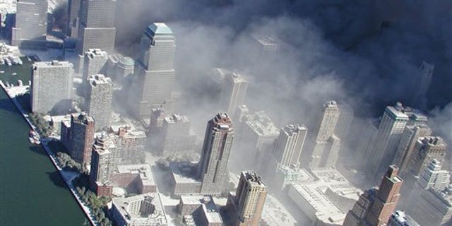 Photo taken Sept. 11, 2001 by the New York City Police Department shows smoke billowing from the grounds of World Trade Centerfollowing the 9/11 attacks.