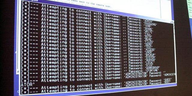 In this Thursday, Jan. 10, 2002, file photo, a computer screen shows a password attack in progress at the Norwich University computer security training program in Northfield, Vt.