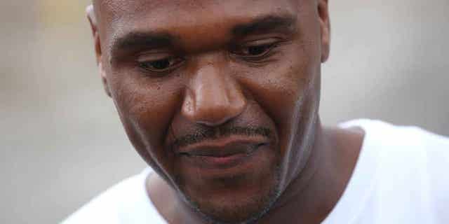 In this Aug. 31, 2012 photo, Alprentiss Nash, who was been behind bars since his murder conviction in 1995, walks free from the Menard Correctional Center in downstate Chester, Ill., after Cook County prosecutors dropped the case against him. Chicago Police said Wednesday, July 29, 2015, that Nash was fatally shot in Chicago, Tuesday, July 28 after after an argument during "some sort of transaction" between Nash and his attacker. (E. Jason Wambsgans/Chicago Tribune via AP)
