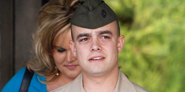 FILE - In this March 22, 2010 file photo, Marine Corps Staff Sgt. Frank Wuterich arrives for a pretrial hearing at Camp Pendleton Marine Corps Base in San Diego County, Calif.