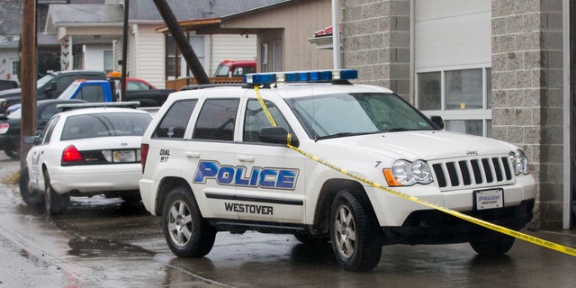 Dec. 1, 2014: Westover Police vehicles are parked outside Doug's Towing in Westover, W.V