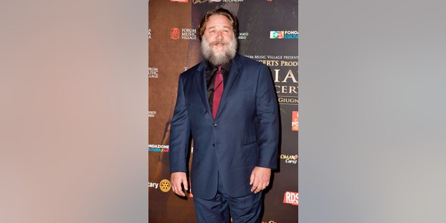 Russell Crowe displays his portly frame and bushy beard as he attends the "Gladiator in Concert" event with Connie Nielsen and Francesco Totti. June 6, 2018