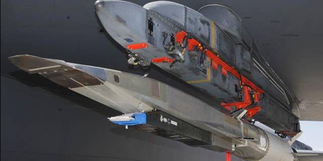 The X-51A WaveRider hypersonic test vehicle was uploaded to a B-52 Stratofortress at Edwards Air Force Base, Calif., July 17 for fit testing.