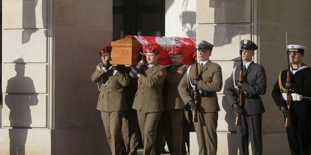 April 17: Honor guards carry the coffin of late Polish President Lech Kaczynski in front of the President's Palace in Warsaw, Poland. President Lech Kaczynski was killed in a plane crash.