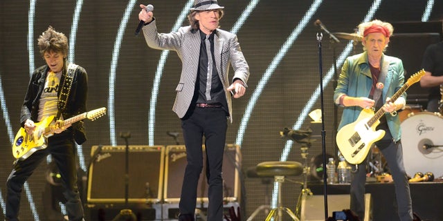 Dec. 15, 2012: In this file photo, singer Mick Jagger, center, guitarists Ronnie Wood, left, and Keith Richards, of The Rolling Stones perform live at the Prudential Center in Newark, N.J.