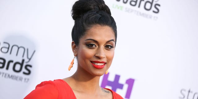 FILE - In this Sept. 17, 2015 file photo, Lilly Singh arrives at the 5th Annual Streamy Awards at the Hollywood Palladium in Los Angeles. "Lazer Team" was the most funded original film in Indiegogos history, and it's been selling out hundreds of theaters for fan screenings since Jan. 27, 2016. In addition to "Lazer Team," YouTube Originals is launching with a documentary profiling YouTube comedienne Lilly "Superwoman" Singh embarking on a world tour, the dance flick "Dance Camp" starring young Internet personalities and a reality series centering on top YouTuber Felix "PewDiePie" Kjellberg living out his nightmares. (Photo by Rich Fury/Invision/AP, File)