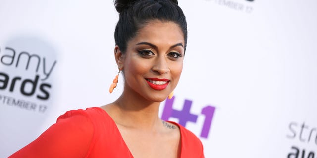 FILE - In this Sept. 17, 2015 file photo, Lilly Singh arrives at the 5th Annual Streamy Awards at the Hollywood Palladium in Los Angeles. "Lazer Team" was the most funded original film in Indiegogos history, and it's been selling out hundreds of theaters for fan screenings since Jan. 27, 2016. In addition to "Lazer Team," YouTube Originals is launching with a documentary profiling YouTube comedienne Lilly "Superwoman" Singh embarking on a world tour, the dance flick "Dance Camp" starring young Internet personalities and a reality series centering on top YouTuber Felix "PewDiePie" Kjellberg living out his nightmares. (Photo by Rich Fury/Invision/AP, File)