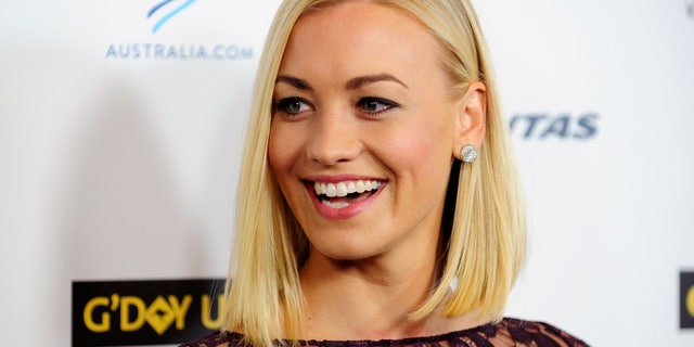 Australian actress Yvonne Strahovski arrives during the G'Day USA Black Tie Gala in Los Angeles, California, January 11, 2014.