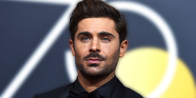 Zac Efron arrives at the 75th annual Golden Globe Awards at the Beverly Hilton Hotel on Sunday, Jan. 7, 2018, in Beverly Hills, Calif. (Photo by Jordan Strauss/Invision/AP)