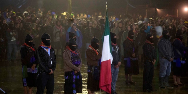 Members of the EZLN mark the 20th anniversary of the Zapatista uprising in Chiapas, Mexico, on Dec. 31, 2013.