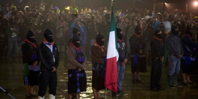 Members of the EZLN mark the 20th anniversary of the Zapatista uprising in Chiapas, Mexico, on Dec. 31, 2013.