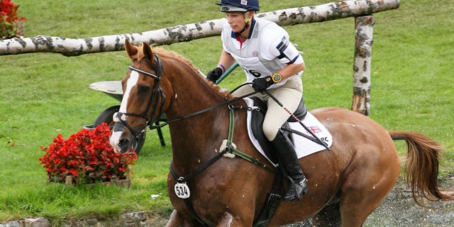 July 7, 2007: This file photo shows Britain's Zara Phillips, granddaughter to Queen Elizabeth II, riding 'Toytown' in the Cross Country Test competition of the Eventing Competitions at the World Equestrian Festival CHIO Aachen 2007 in Aachen, western Germany.