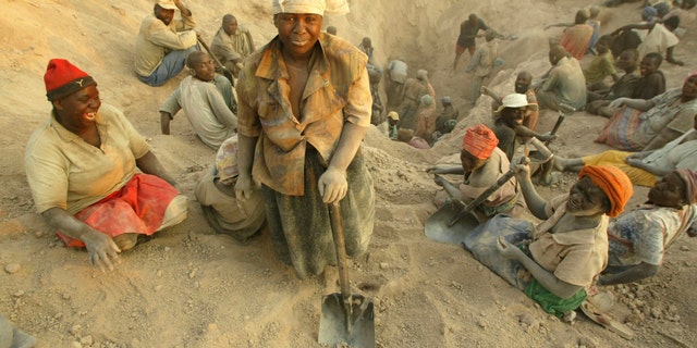 Nov. 1, 2006 FILE photo of miners digging for diamonds in Marange, eastern Zimbabwe.