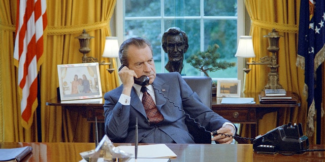 U.S. President Richard Nixon seated at his desk in the White House Oval Office in Washington, U.S., June 1972.