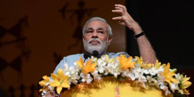 Gujarat state Chief Minister Narendra Modi speaks in Gandhinagar on September 9, 2013.