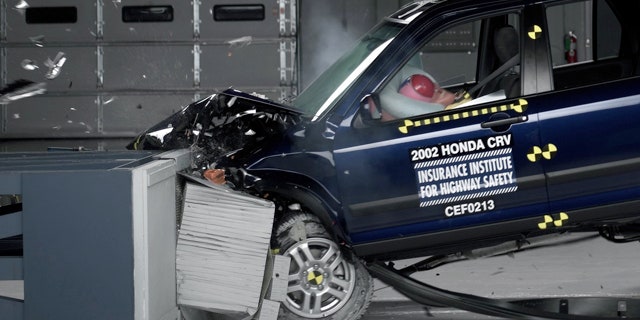 This undated photo provided by the Insurance Institute for Highway Safety shows a crash test of a 2002 Honda CR-V, one of the models subject to a recall to repair faulty air bags. The federal government is demanding that the auto industry recall millions of additional cars equipped with faulty air bags that can injure and even kill a driver. (AP Photo/Insurance Institute for Highway Safety)