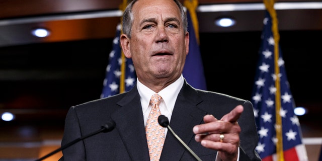 House Speaker John Boehner of Ohio responds to reporters about the problems in passing the Homeland Security budget because of Republican efforts to block President Barack Obama's executive actions on immigration, Thursday, Feb. 26, 2015, during a news conference on Capitol Hill in Washington. The House voted last month to end Homeland Security funding on Saturday unless Obama reverses his order to protect millions of immigrants from possible deportation. After Democratic filibusters blocked the bill in the Senate, the chamber's Republican leaders agreed this week to offer a "clean" funding measure, with no immigration strings attached. (AP Photo/J. Scott Applewhite)