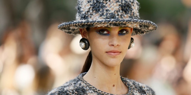 File photo: A model presents a creation by German designer Karl Lagerfeld as part of his Haute Couture Fall/Winter 2017/2018 collection for fashion house Chanel in Paris, France, July 4, 2017. (REUTERS/Gonzalo Fuentes)