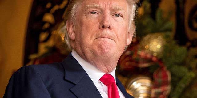 President-elect Donald Trump takes a question from a member of the media at Mar-a-Lago, in Palm Beach, Fla., Wednesday, Dec. 21, 2016. Trump on Thursday abruptly called for the United States to “greatly strengthen and expand its nuclear capability” until the rest of the world “comes to its senses” regarding nuclear weapons. Trump made the statement on Twitter and did not expand on either the actions he wants the U.S. to take or the issues he sees around the world. (AP Photo/Andrew Harnik)