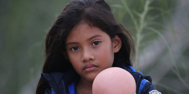 Salvadorian Stefany Marjorie, 8, after crossing the Rio Grande from Mexico on July 24, 2014 near Mission, Texas.