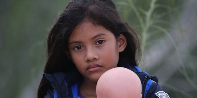 Salvadorian Stefany Marjorie, 8, after crossing the Rio Grande from Mexico on July 24, 2014 near Mission, Texas.