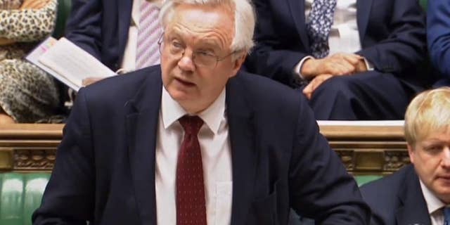 Britain's Brexit Secretary David Davis speaks in the House of Commons, London during the second reading debate on the EU (Notification on Withdrawal) Bill, Tuesday, Jan. 31, 2017. British lawmakers are starting debate on a bill authorizing the start of European Union exit talks, as the government races to meet a self-imposed March 31 deadline to begin the process. (PA via AP)