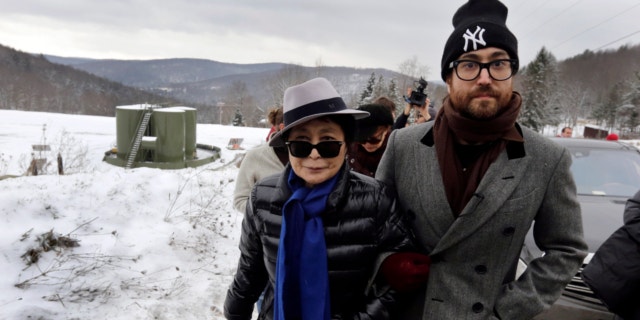 Yoko Ono, left, and her son Sean Lennon visit a fracking site in Franklin Forks, Pa., during a bus tour of natural-gas drilling sites in northeastern Pennsylvania, Jan. 17, 2013. (Associated Press).