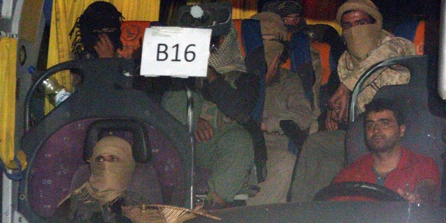 A convoy of Islamic State fighters and their families have crossed into areas controlled by the extremists despite U.S. threats to bomb the convoy.