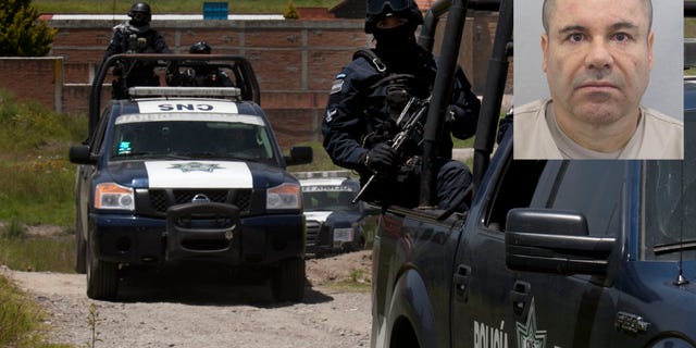 Federal Police stand guard near a half-built house near the Altiplano maximum security prison in Almoloya, July 13, 2015.