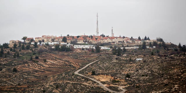 A general view of the West Bank Jewish settlement of Psagot near Ramallah, Monday, Jan. 27, 2014. The Palestinians' "extreme and reckless" rejection of an Israeli suggestion that some Jewish settlers remain in a future Palestinian state proves that they don't want peace, Prime Minister Benjamin Netanyahu's office said Monday. The harshly worded statement follows a flurry of back-and-forth condemnations sparked by an Associated Press report that Netanyahu believes all Jewish settlers should have the right to remain in their homes in a future Palestine. (AP Photo/Sebastian Scheiner)