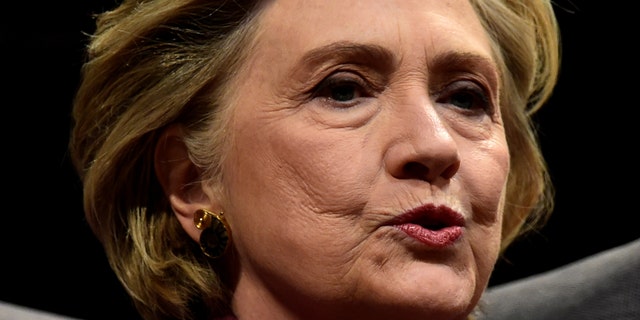 Former U.S. Secretary of State, Hillary Clinton speaks during an interview with Mariella Frostrup at the Cheltenham Literature Festival in Cheltenham, Britain Oct. 15, 2017. (REUTERS/Rebecca Naden)