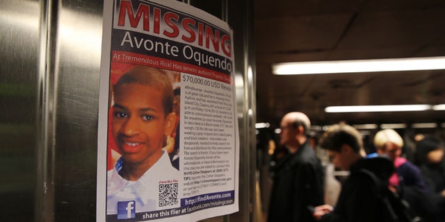 A poster for a missing autistic 14-year-old named Avonte Oquendo hangs in subway station on October 21, 2013 in New York City.