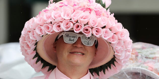 A patron wears a derby hat before the 2017 Kentucky Oaks at Churchill Downs.