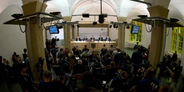 Saxony attourney general Klaus Fleischmann, Willi Schmid, corrections department head of the Saxon justice ministry; Rolf Jacob, director of the Justizvollzugsanstalt (JVA) Leipzig prison, ,and Saxony justice minister Sebastian Gemkow, from left, speak during a press conference on the death in Leipzig JVA of Jaber al-Bakr, who was arrested on suspicion of terrorism, during a press conference in Dresden, Germany, Thursday, Oct. 13, 2016. The 22-year-old Syrian was found hanged in his cell on Wednesday night. (Arno Burgi/dpa via AP)