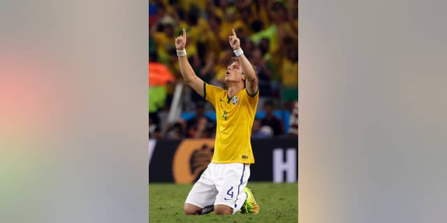 Brazil's David Luiz celebrates at the end of the World Cup quarterfinal soccer match between Brazil and Colombia at the Arena Castelao in Fortaleza, Brazil, Friday, July 4, 2014. Brazil won the match 2-1. (AP Photo/Felipe Dana)