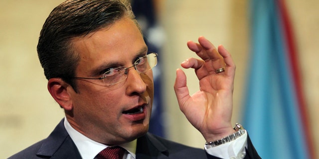Puerto Rico Gov. Alejandro Garcia Padilla delivers his budget address on April 30, 2015.